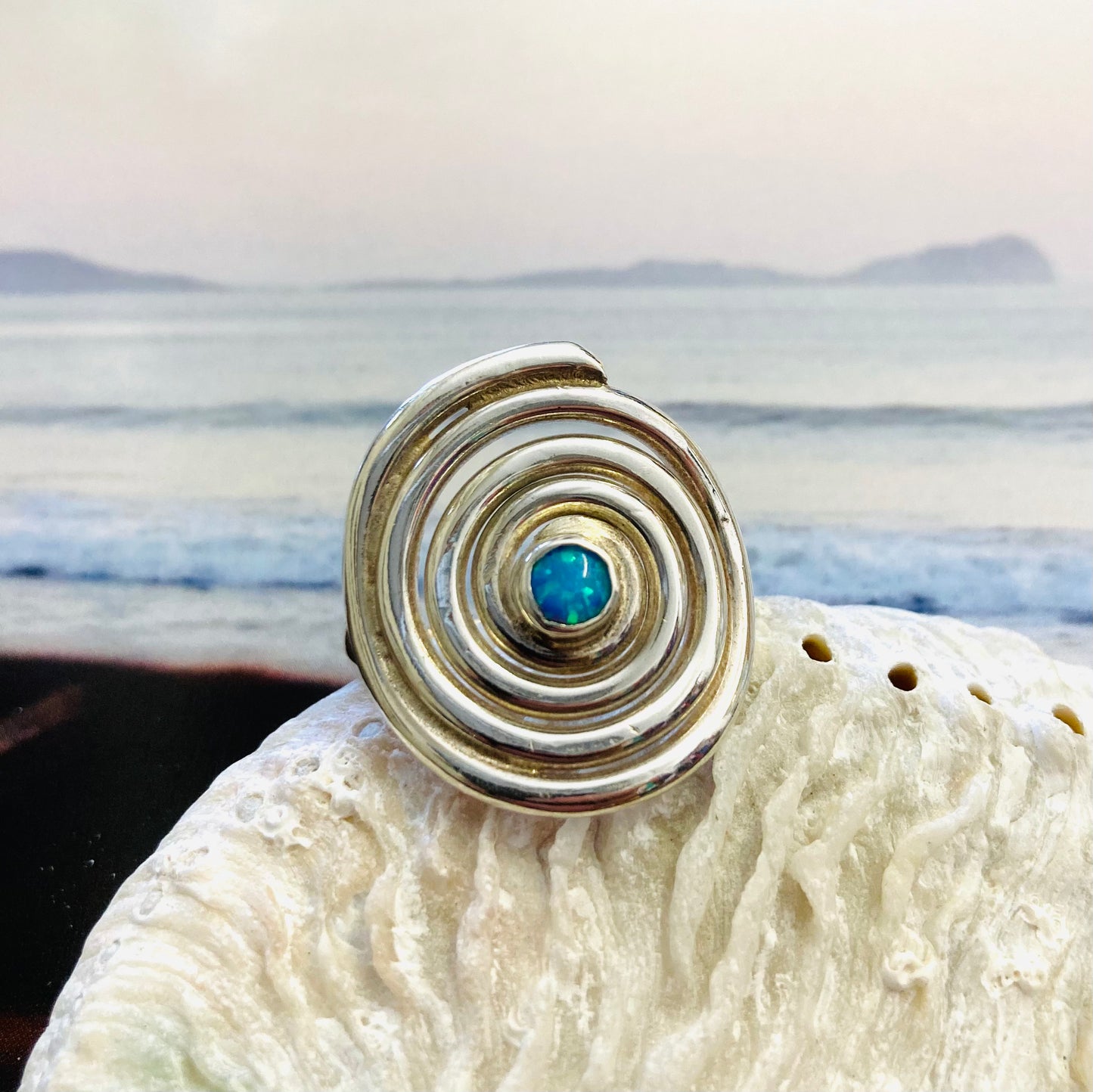 Silver spiral ring with opal