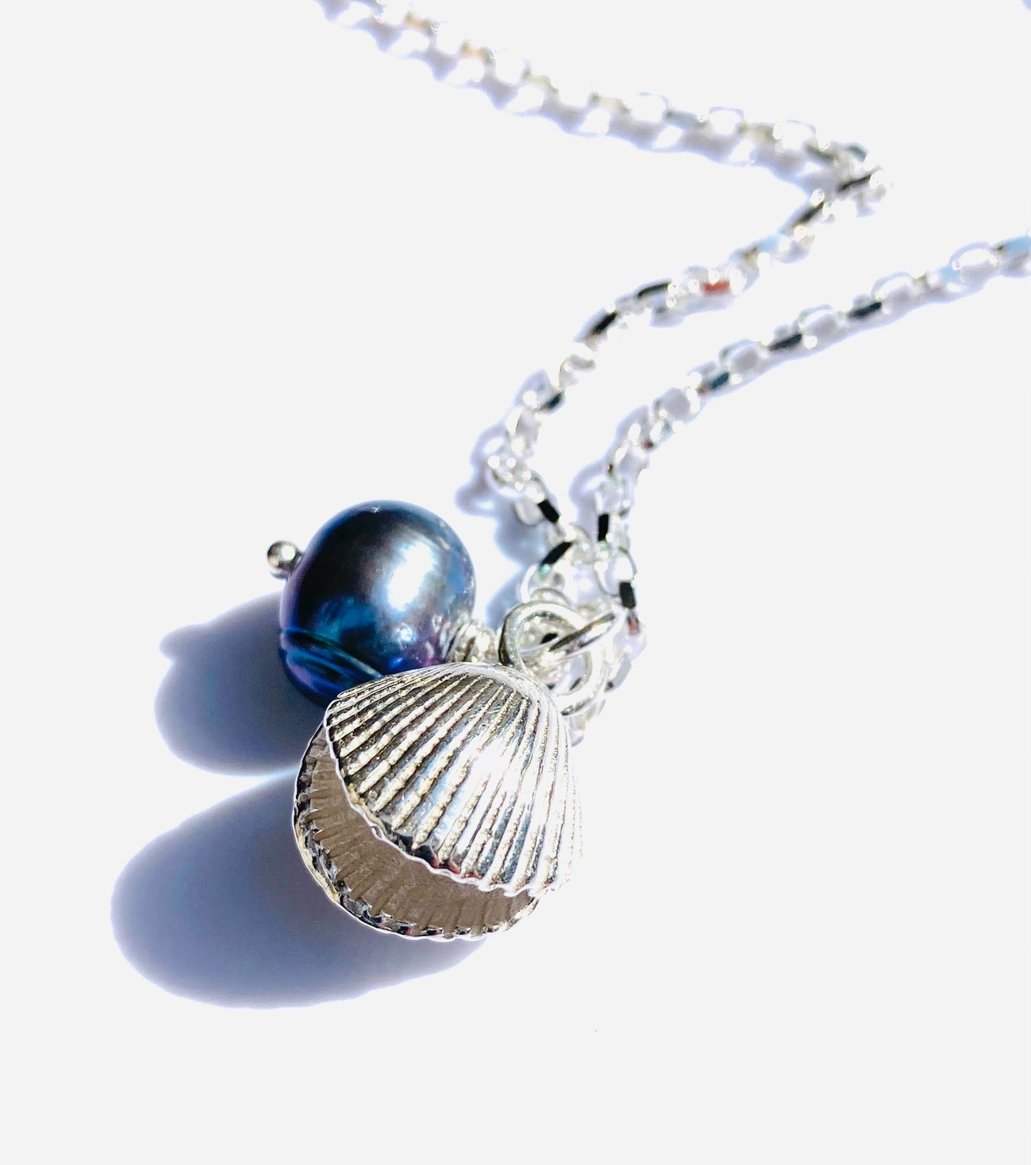Silver cockle shell necklace