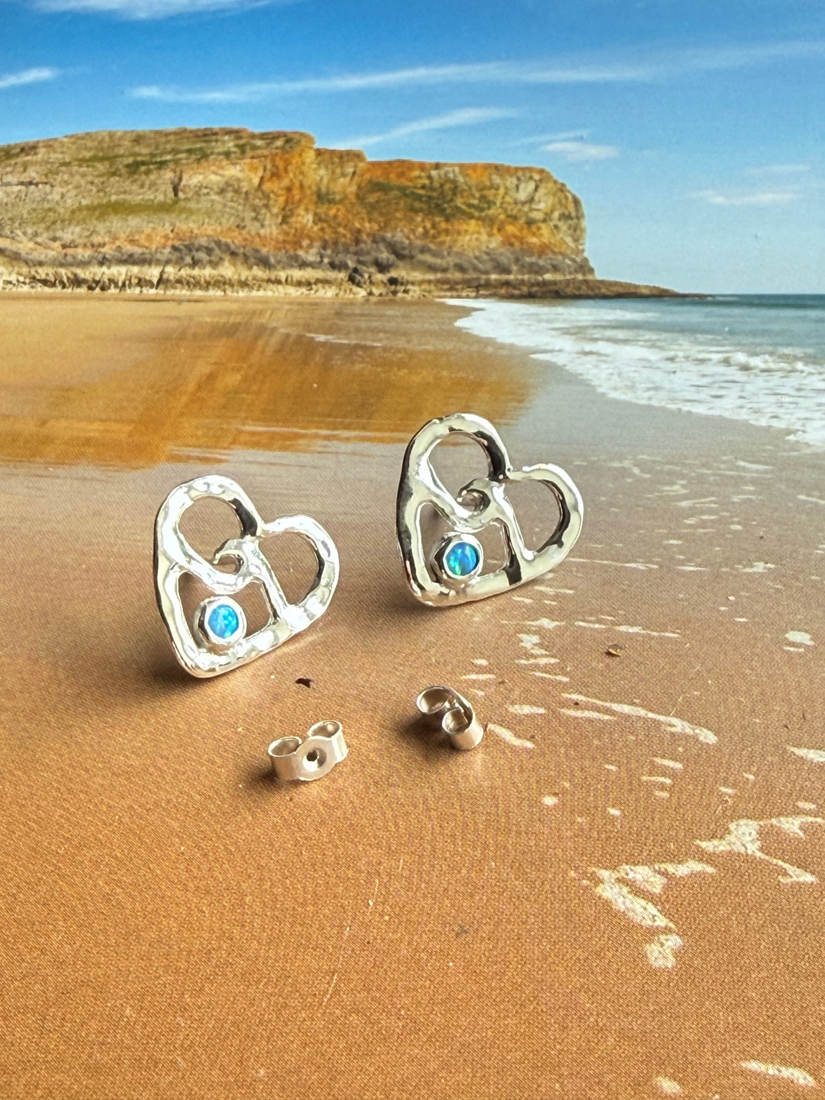 Wave and heart opal set stud earrings