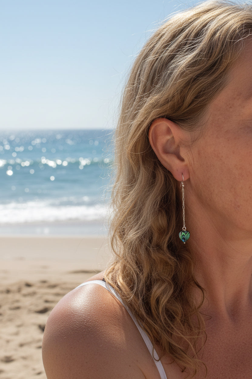 Abalone shell heart long drop earrings.