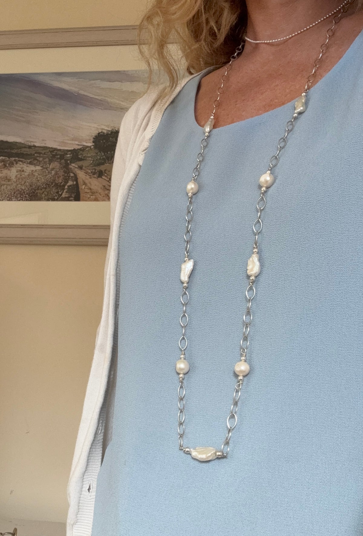 White pearls and silver chain necklace