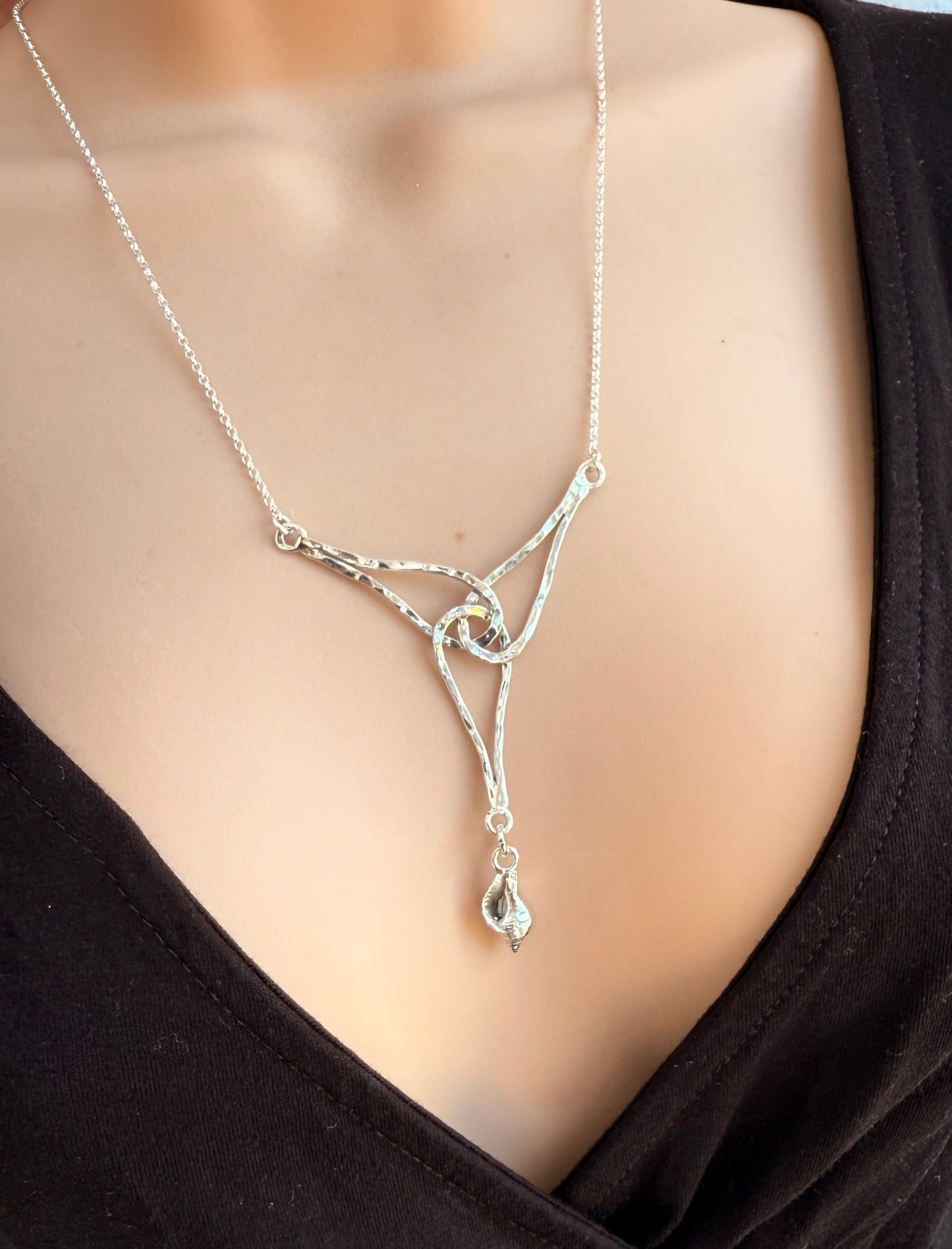 Celtic whelk shell necklace made by Gower silversmith