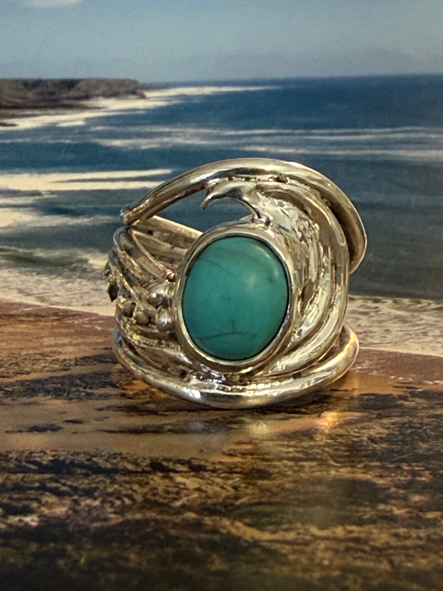 Silver wave and pebbles ring