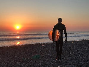 Sunset surfer