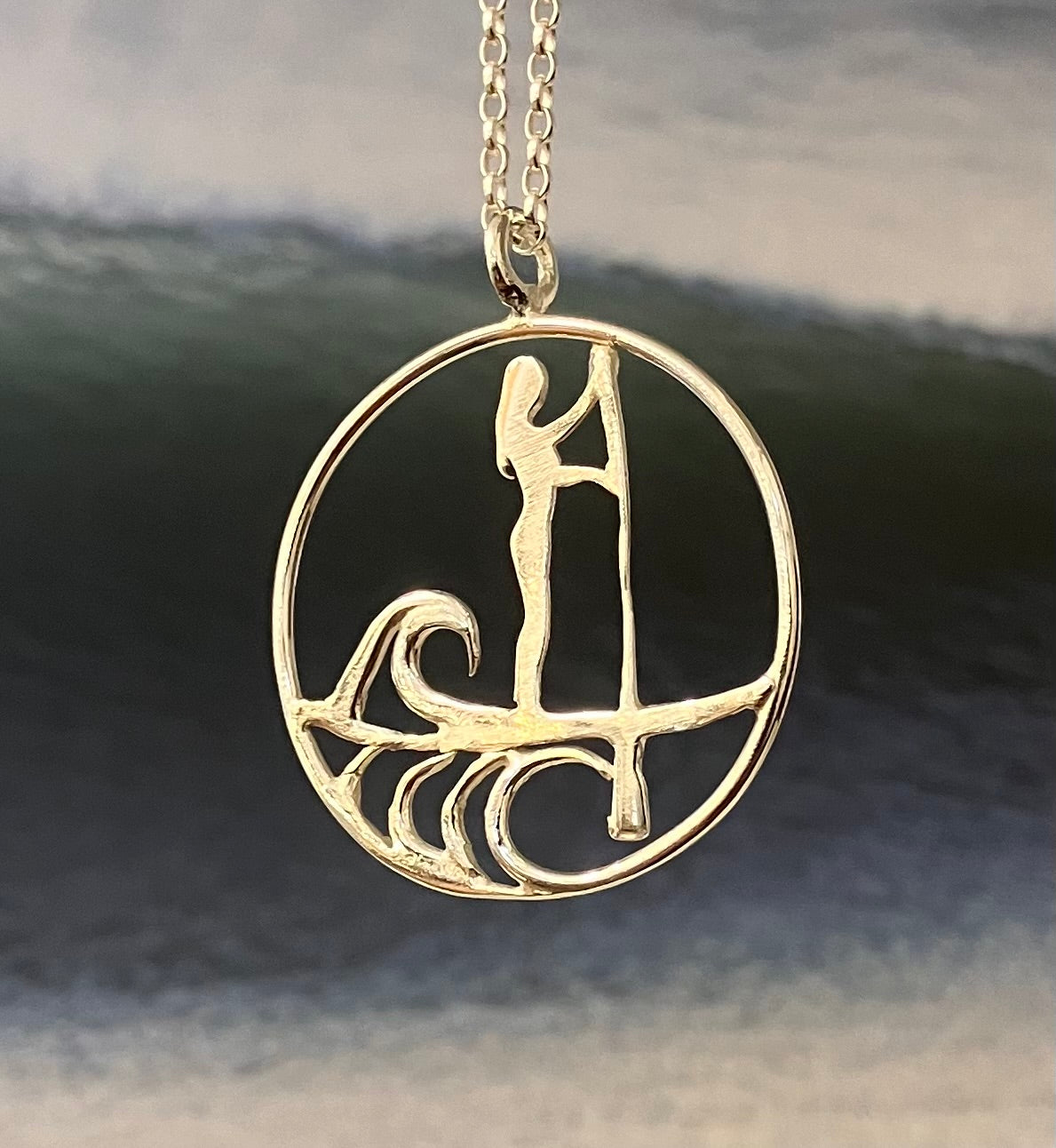Stand up paddle boarder on a wave necklace