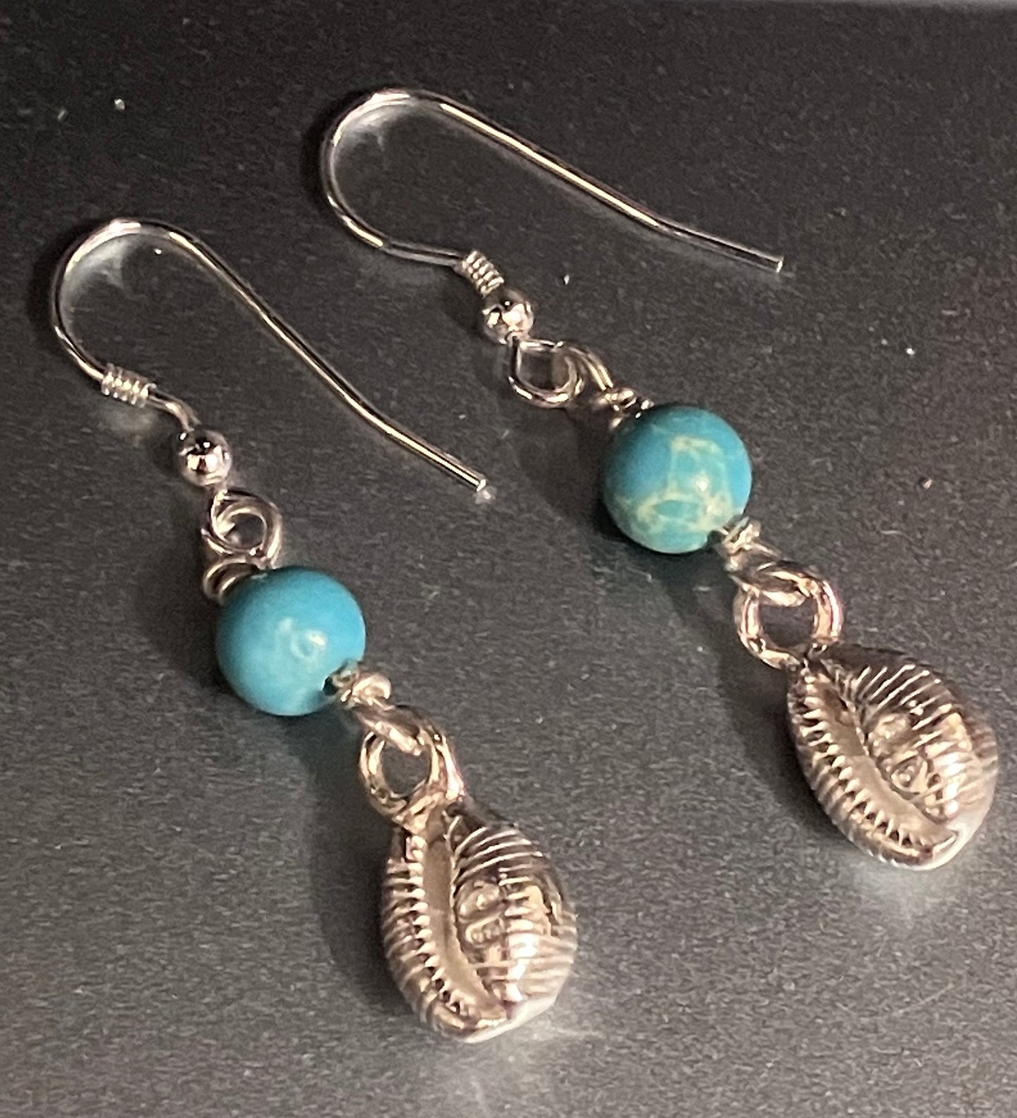 cowrie shell earrings with turquoise coloured bead