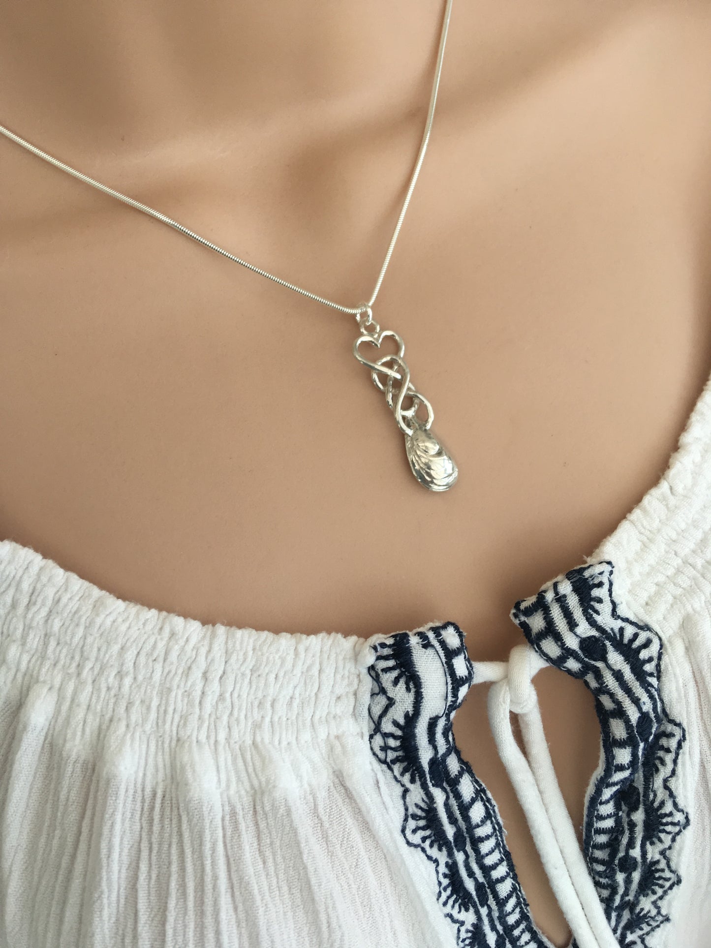 Mussel shell lovespoon on