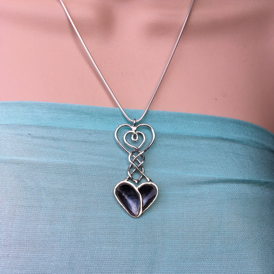 Silver lovespoon celtic mussel shell heart