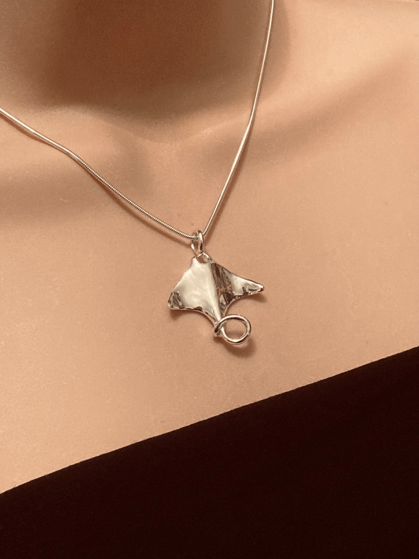 Silver manta ray necklace