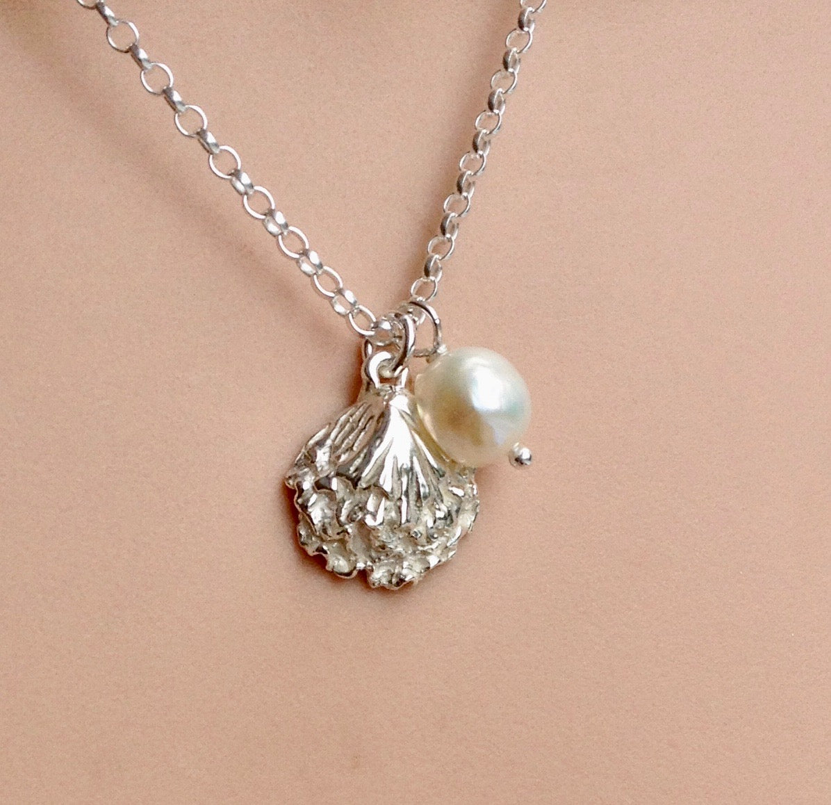 Oyster shell necklace in silver from Gower with white pearl