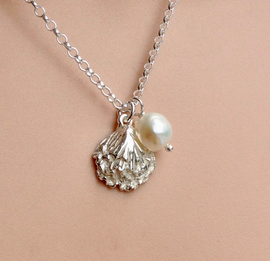 Oyster shell necklace in silver from Gower with white pearl