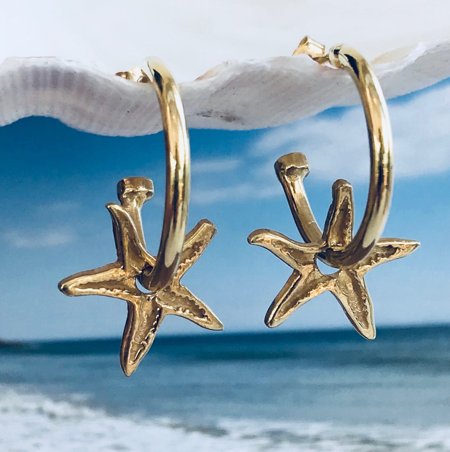 gold starfish hoop earrings