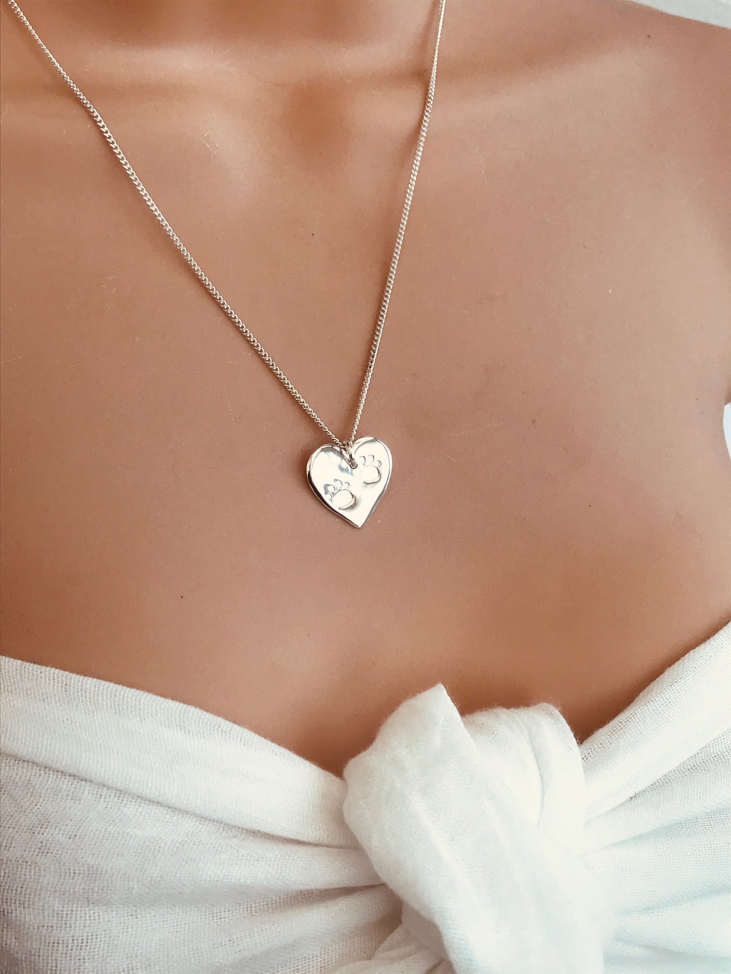 paw print heart necklace