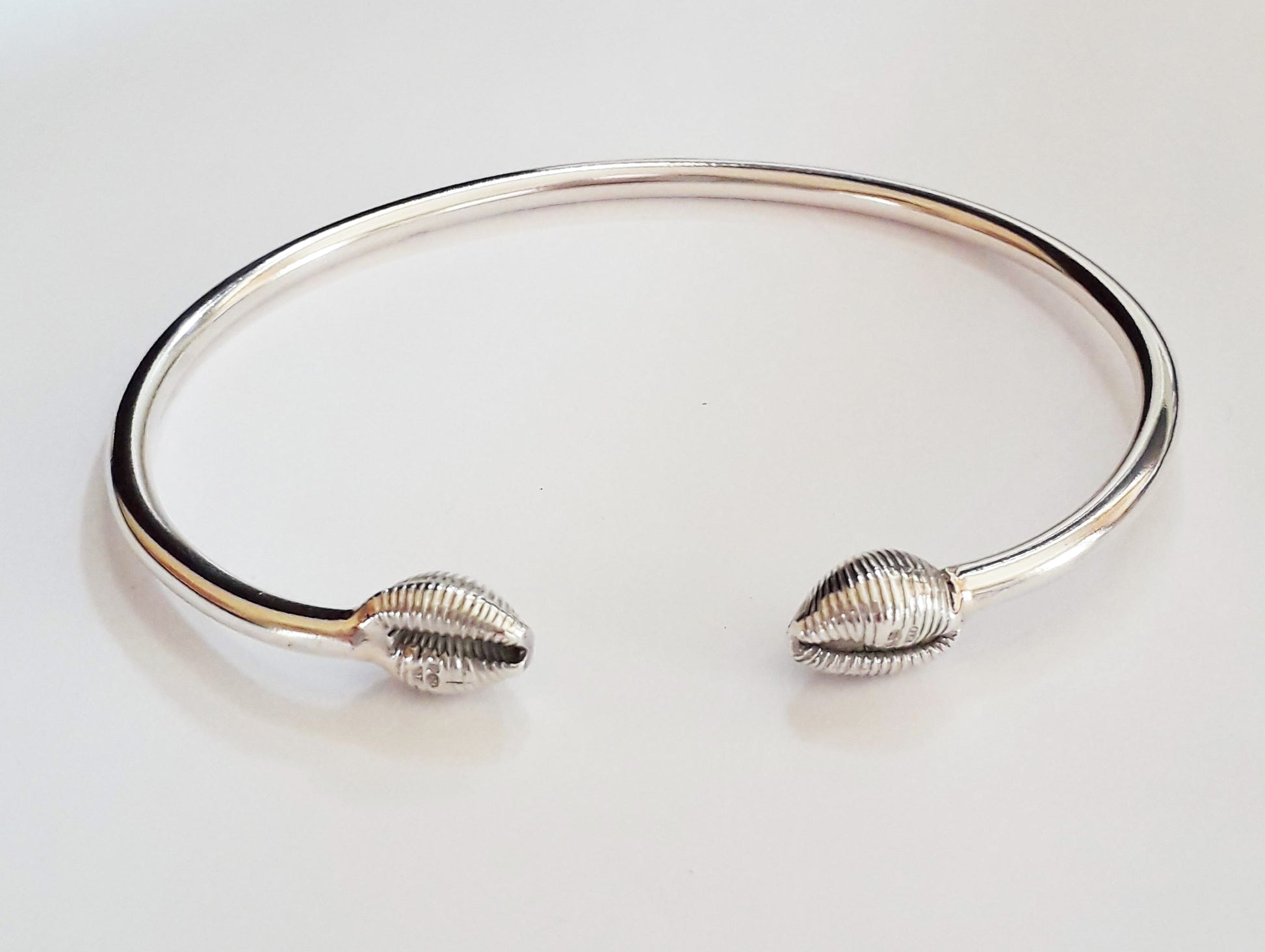 Cowrie shell cuff bracelet