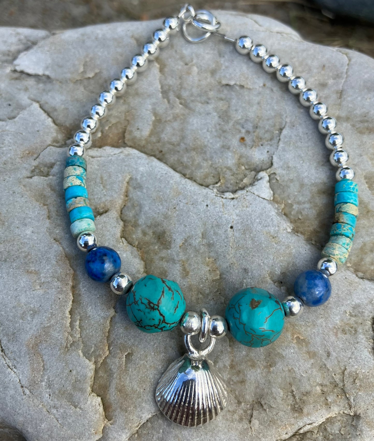 Silver cockle shell bracelet