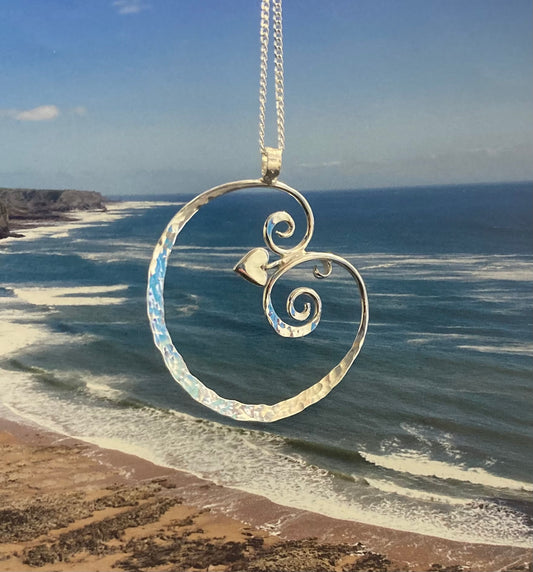 Heart and wave curl pendant