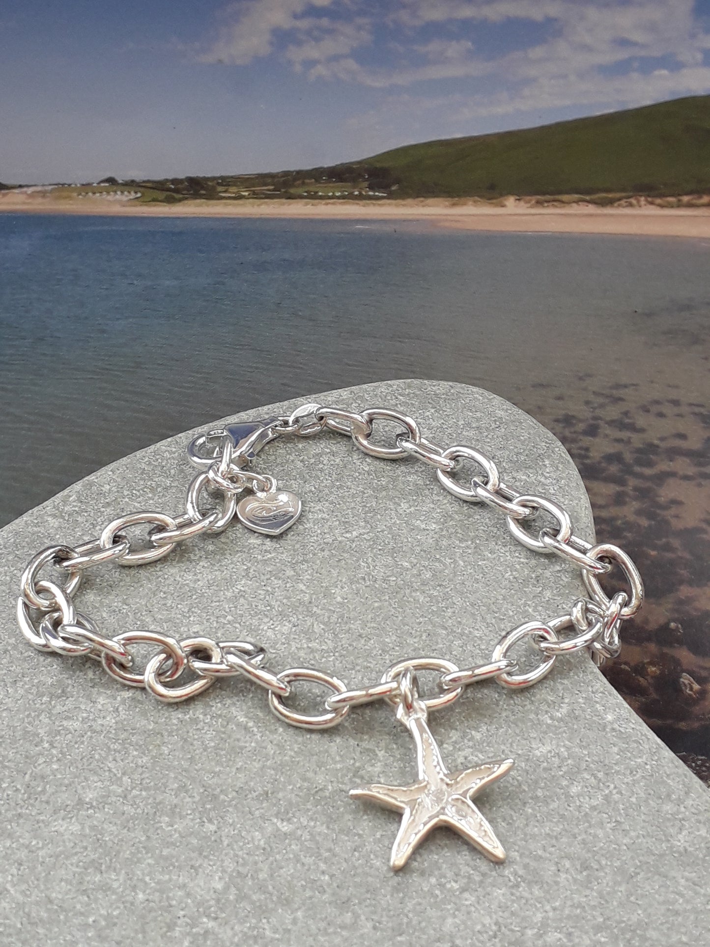 Silver charm bracelet with starfish