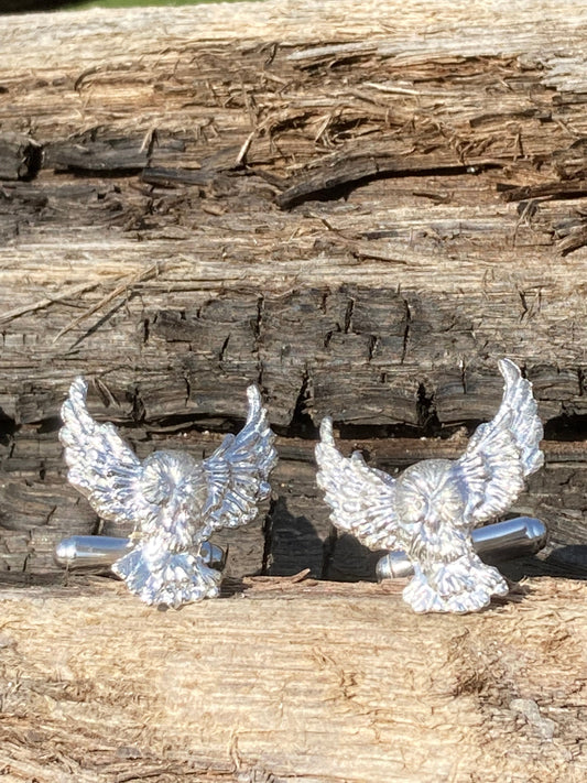 Silver owl cufflinks made by sand casting in the workshop on Gower