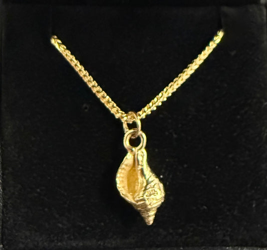 Solid Gold whelk shell necklace on a solid 9ct gold chain 