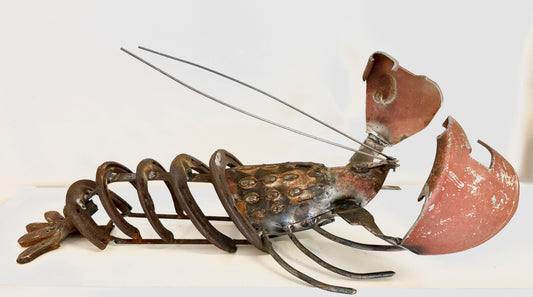 Lobster sculpture made from horse shoes