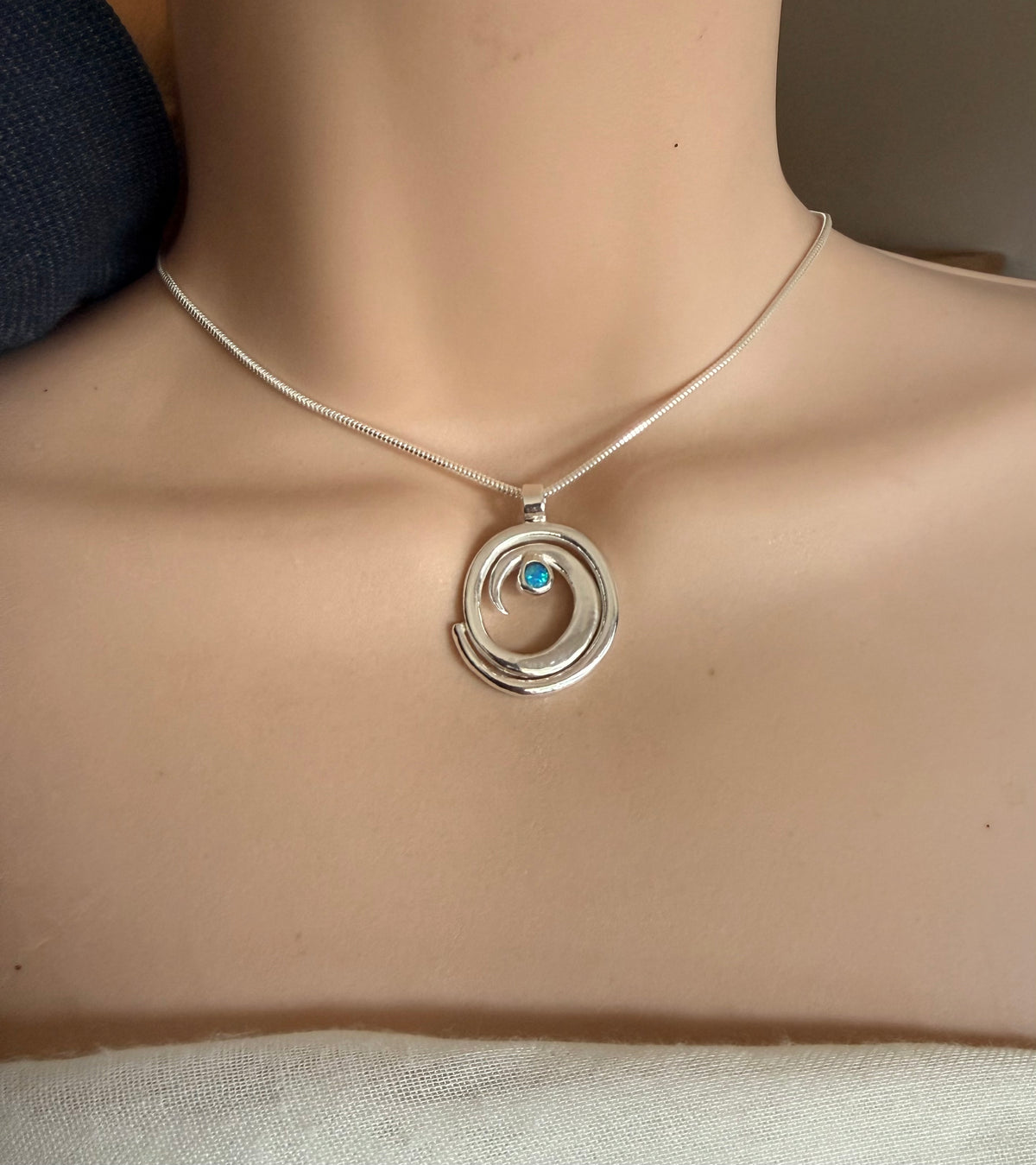 Barreling wave pendant with opal