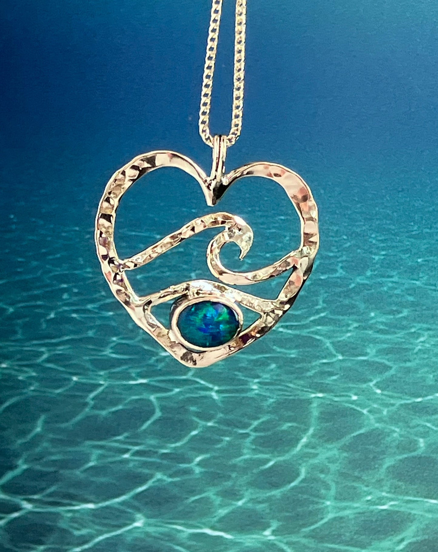 Solid gold wave heart necklace with opal