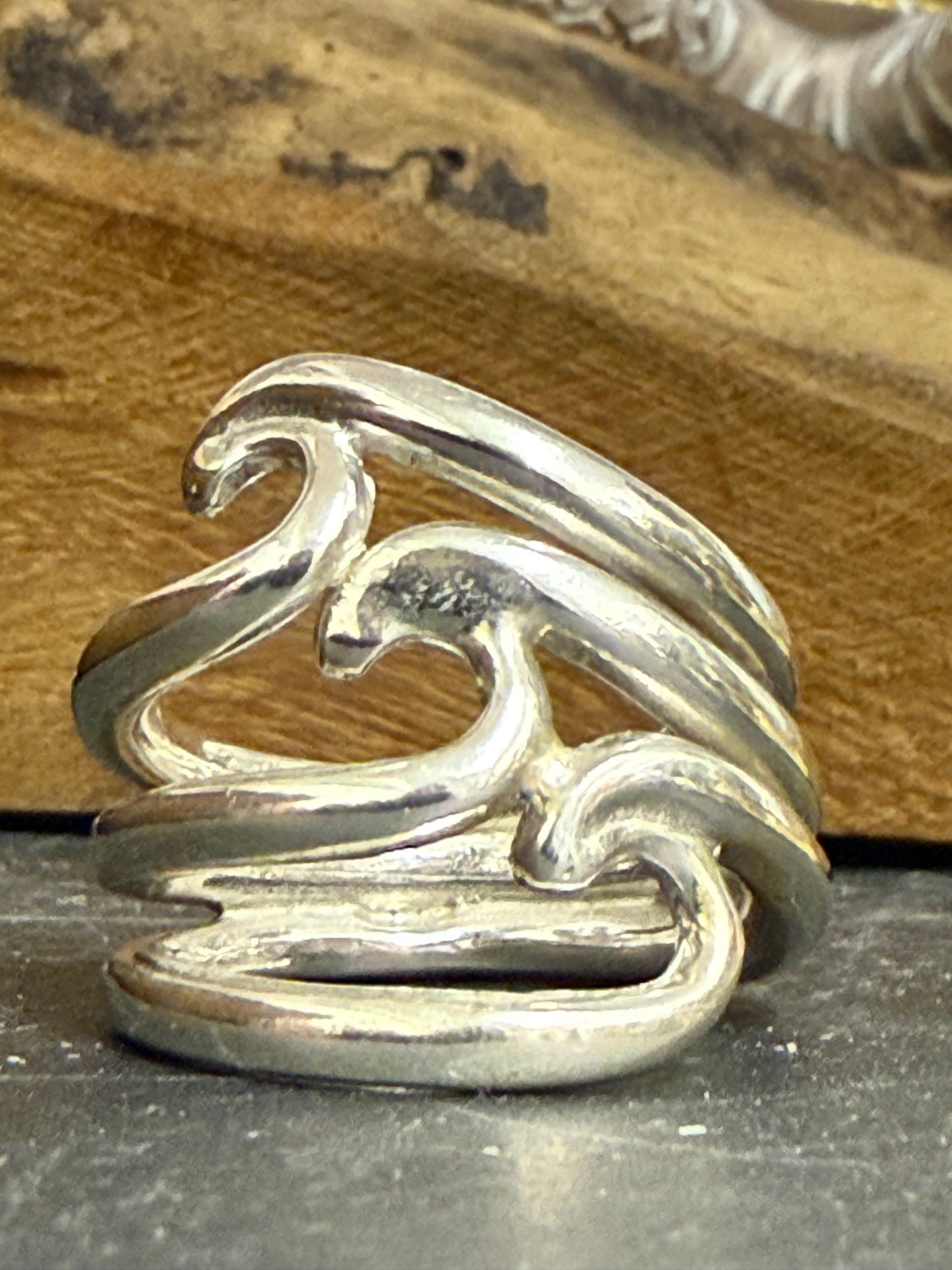 Surf ring in solid silver three waves stacked on top of each other 