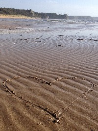 Heart in sand card