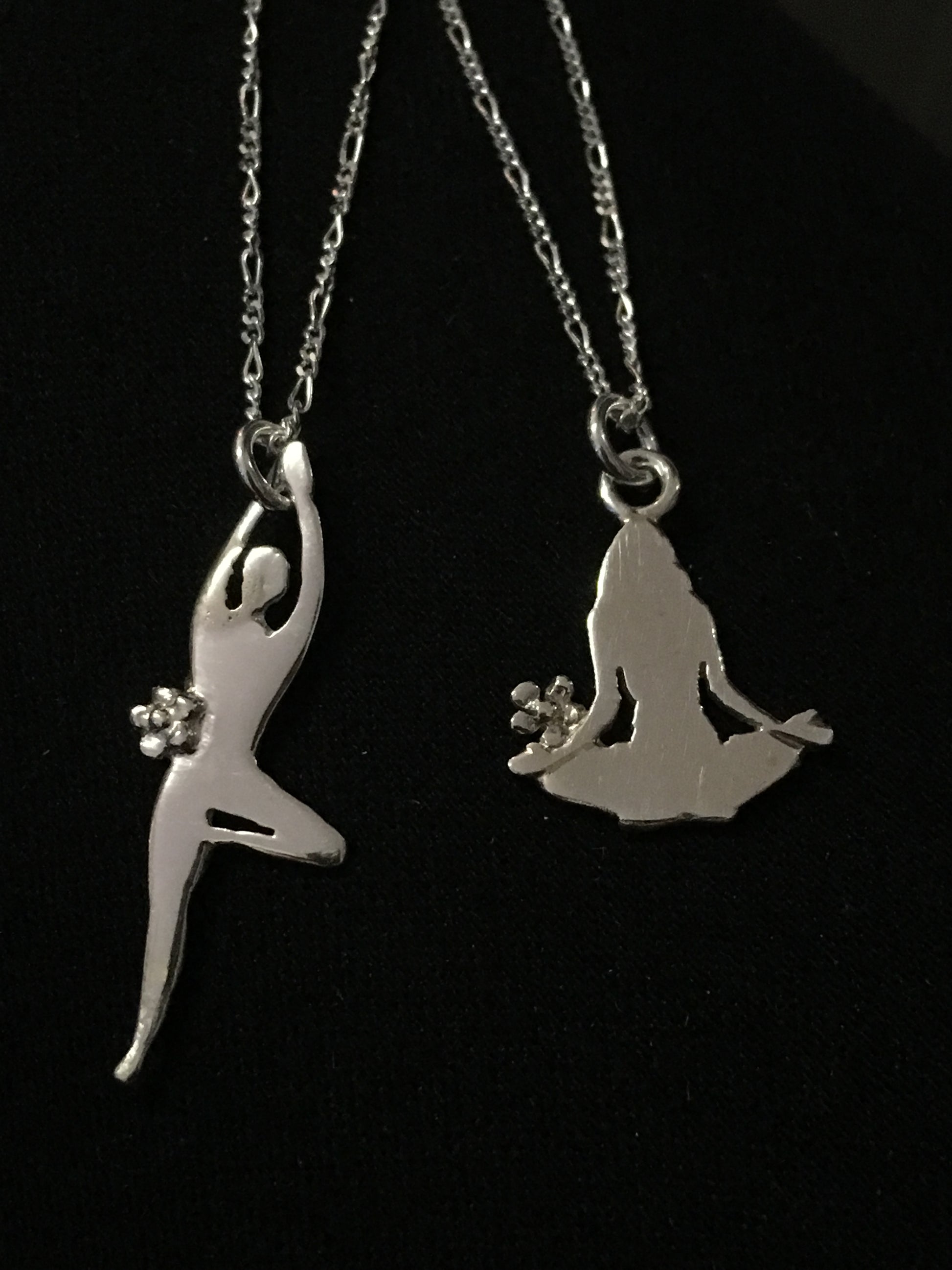 Sanding and seated pose necklace