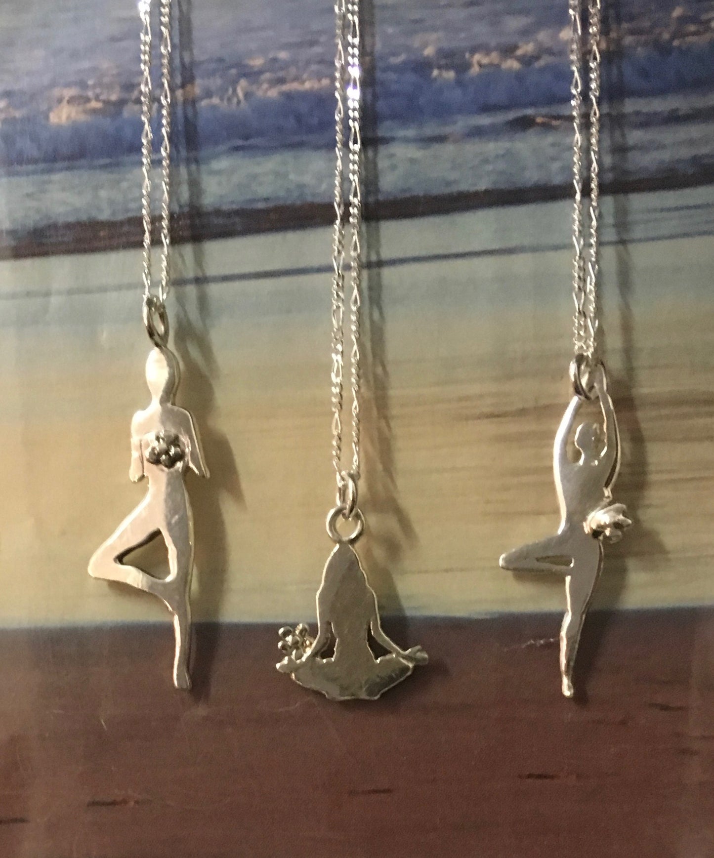 Standing and seated pose necklaces
