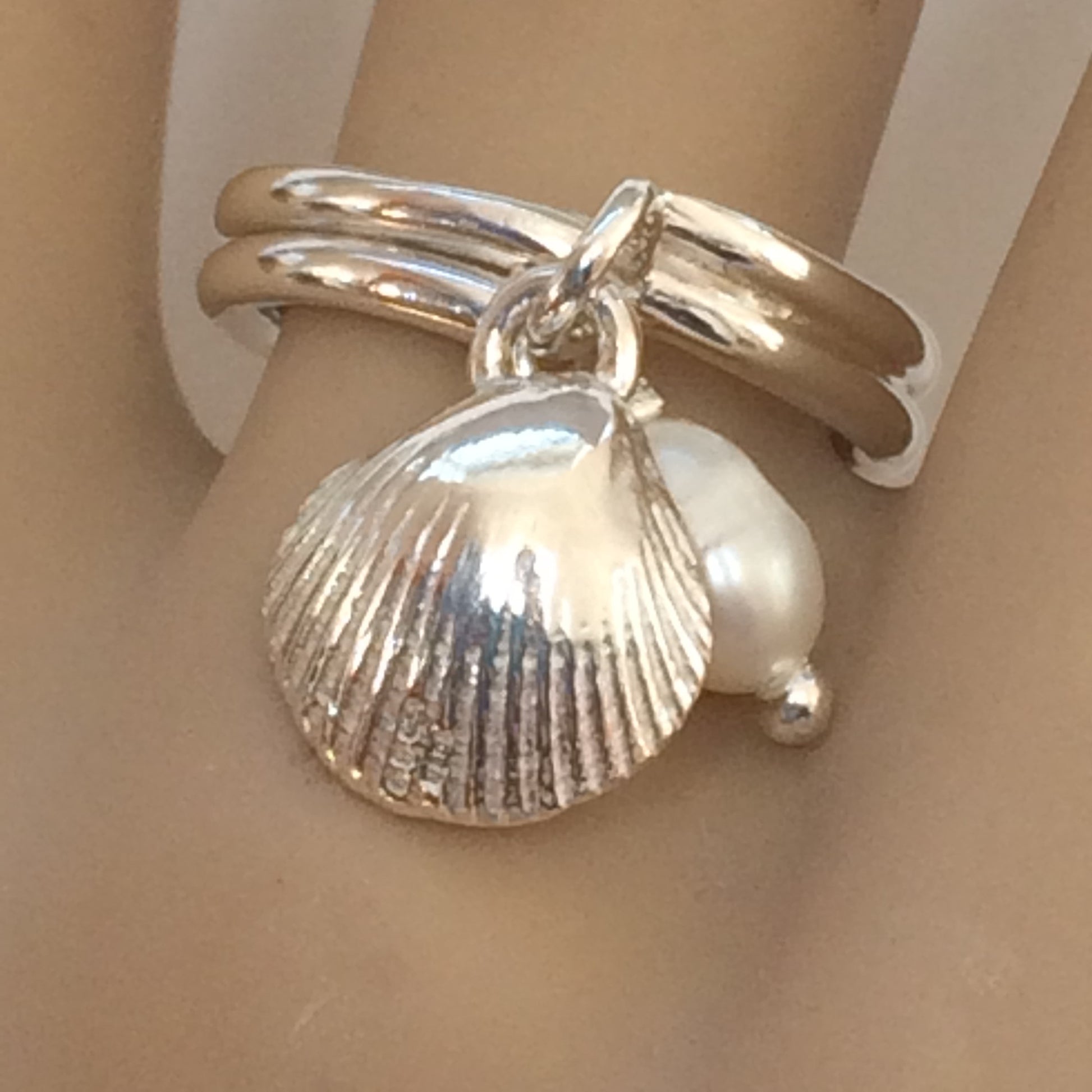 Cockle and pearl charm ring