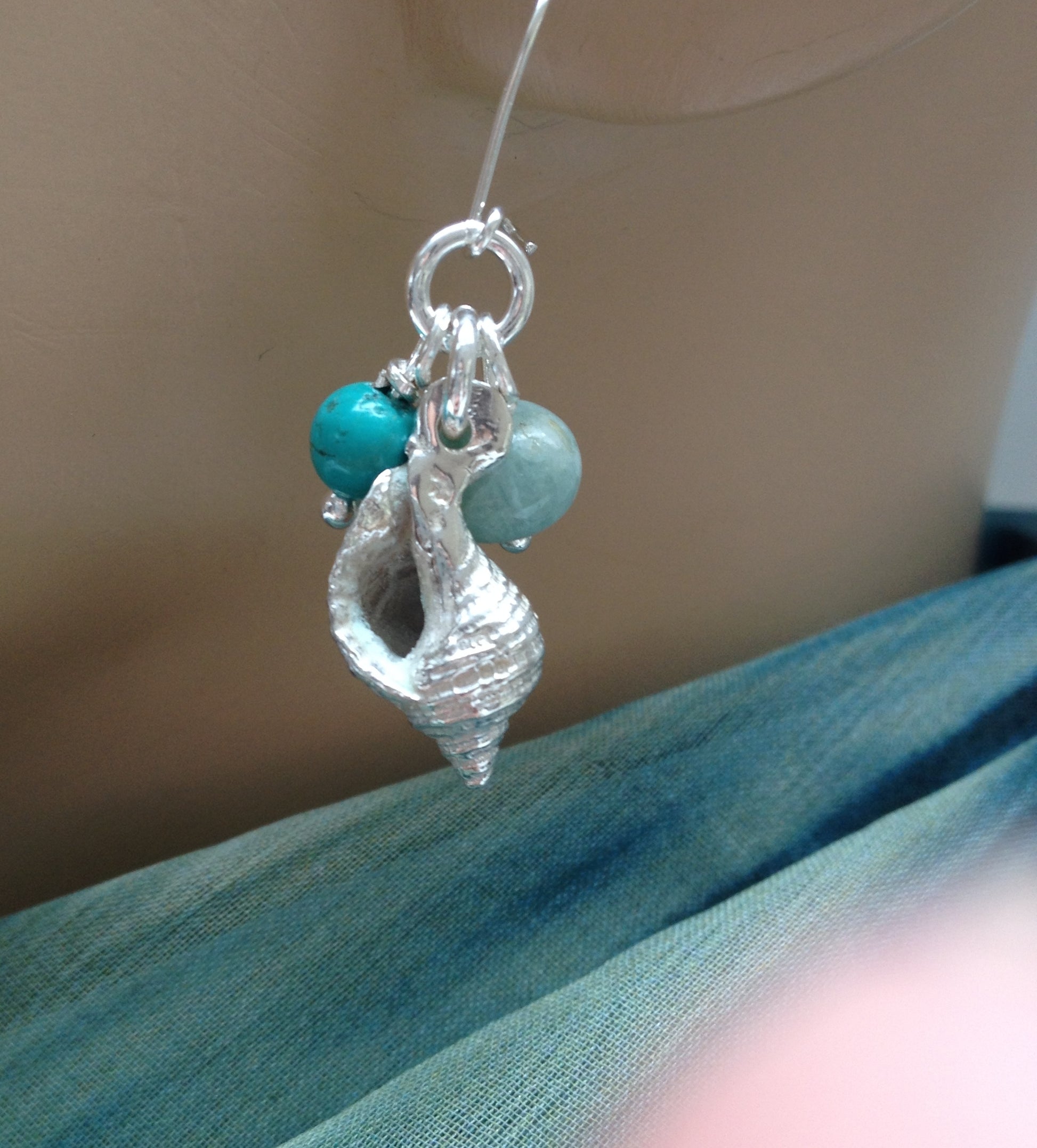 Turquoise and amazonite beaded silver whelk shell earrings