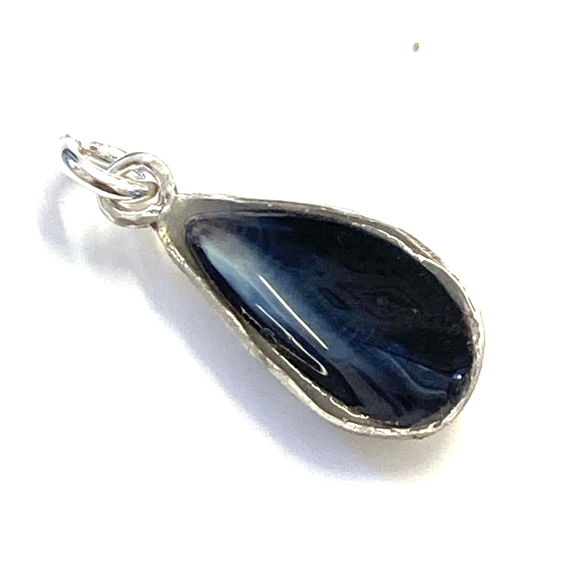 Real Mussel shell set in silver charm front view 