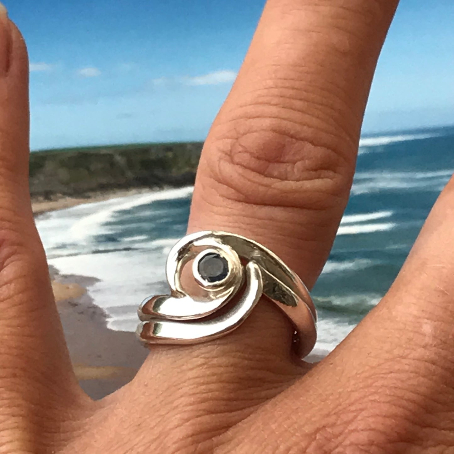 Wave silver sapphire ring