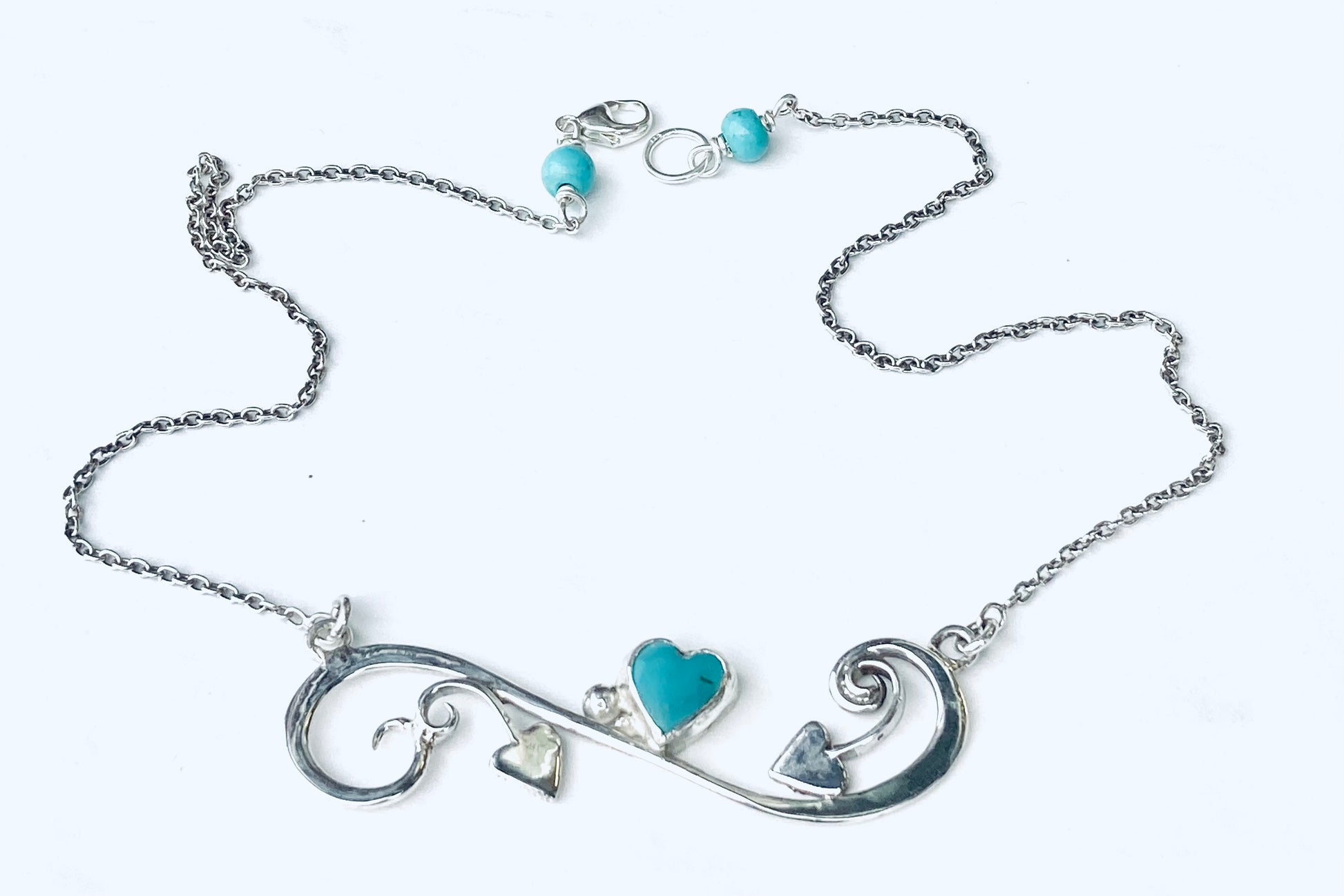 turquoise and silver hearts necklace