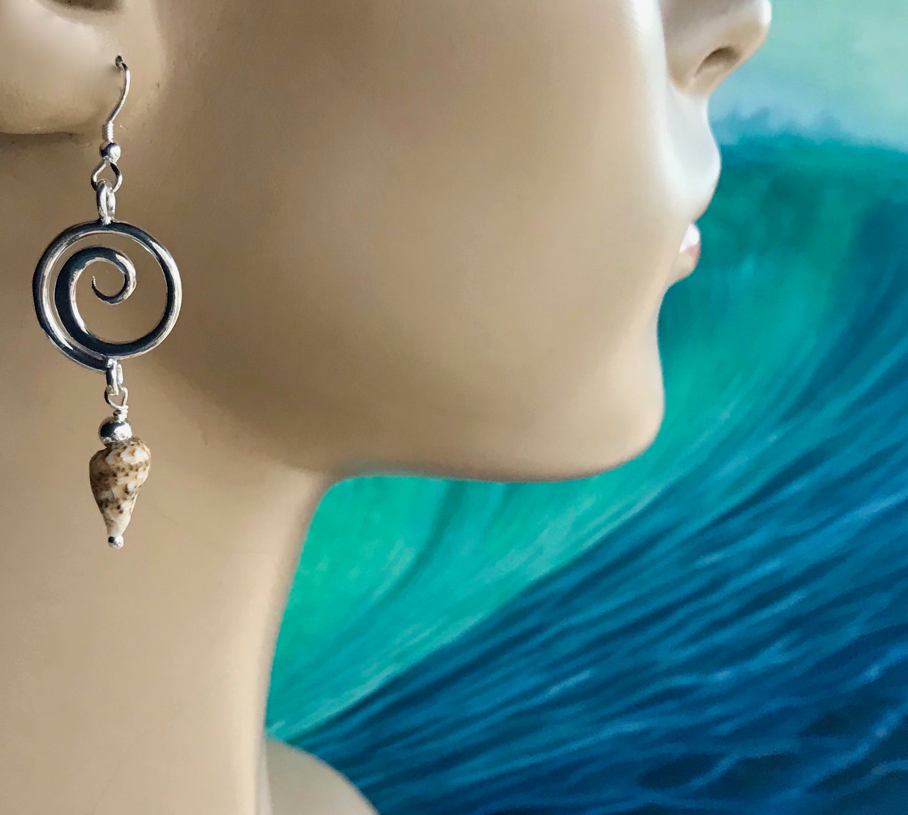 Wave earrings with shell drop
