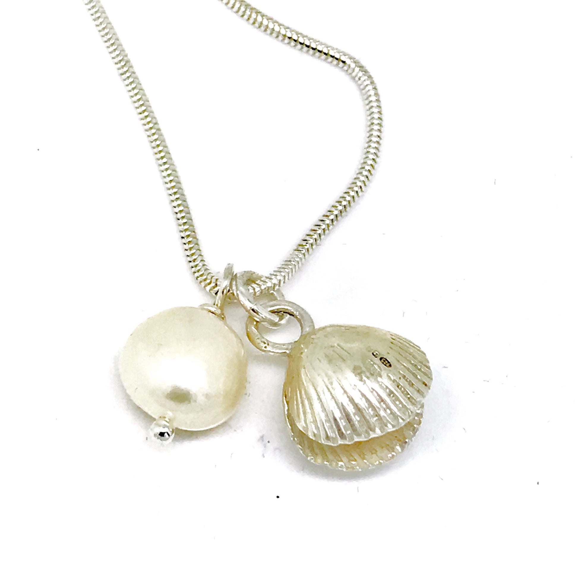 Silver double sided cockle shell and pearl necklace