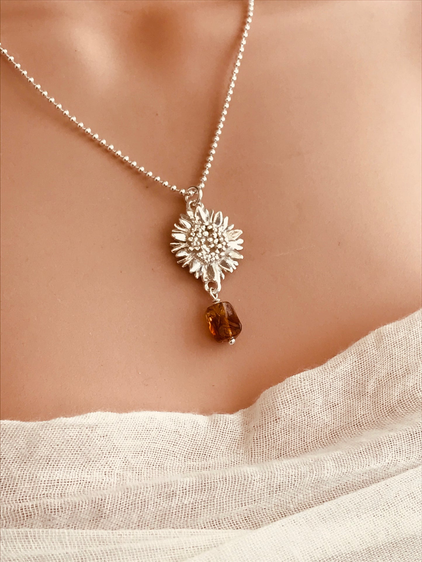 Sunflower necklace with amber bead