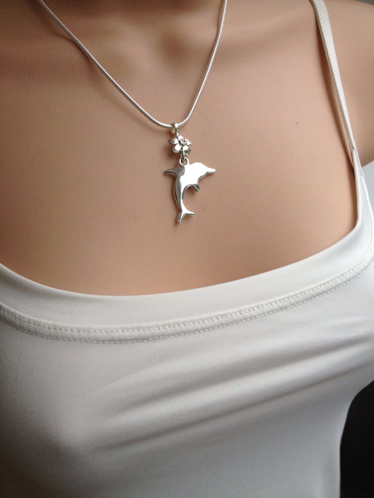 Dolphin necklace with flower