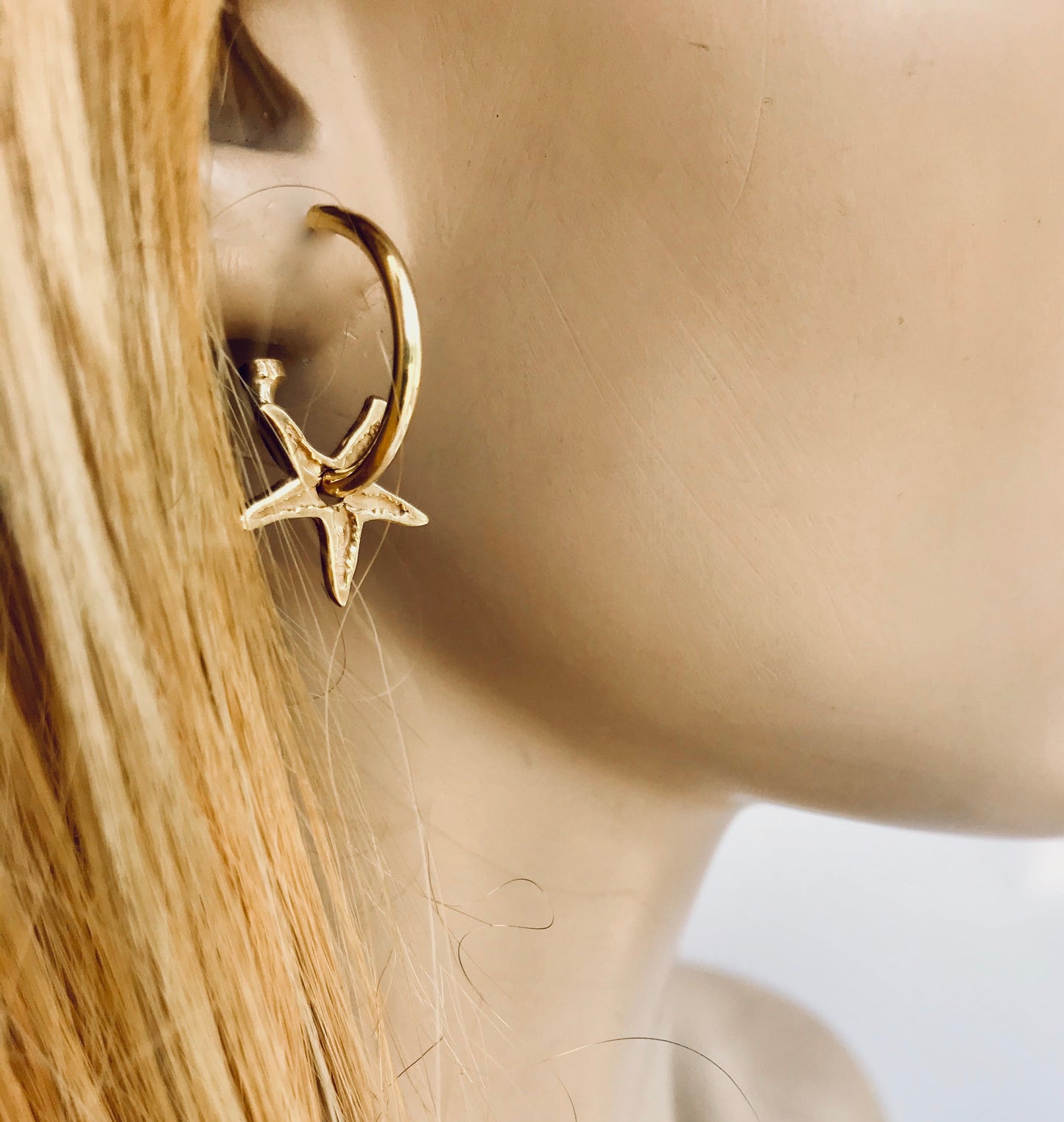 gold starfish hoop earrings