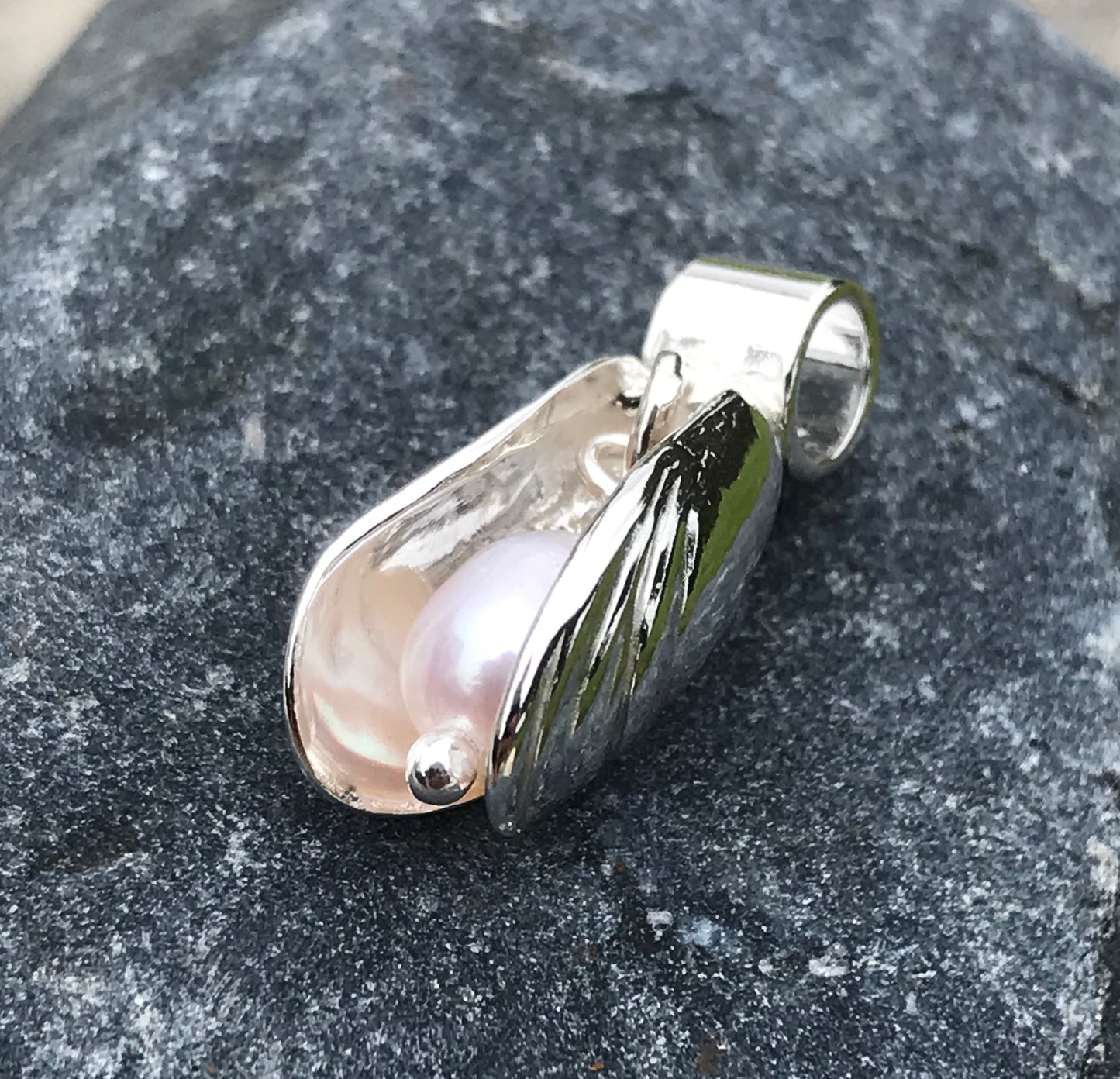 Mussel shell and pearl silver charm