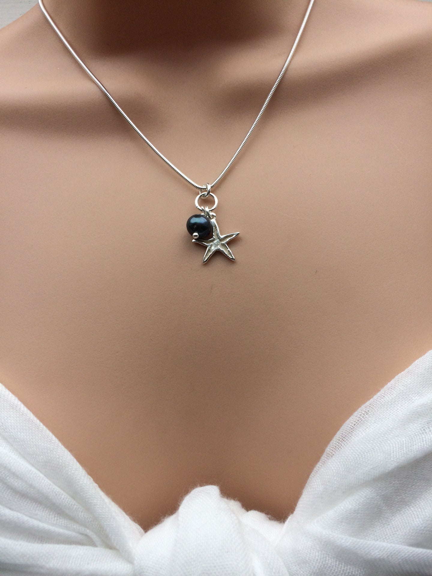starfish and black pearl necklace