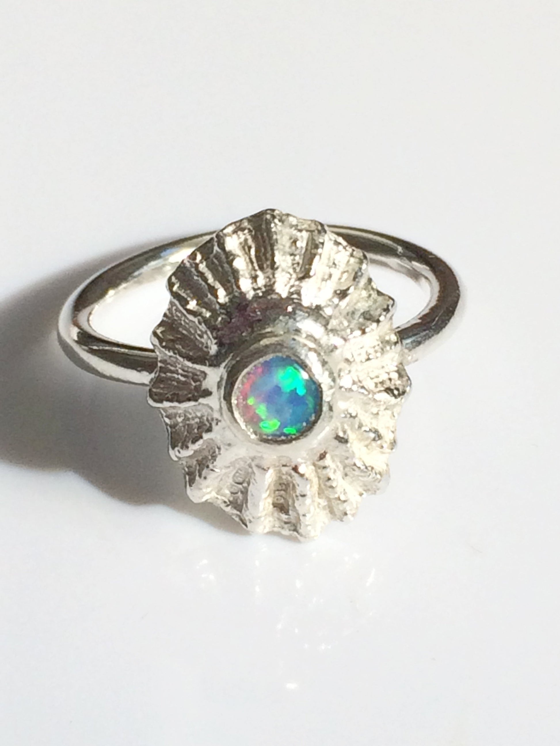 Limpet and opal set ring
