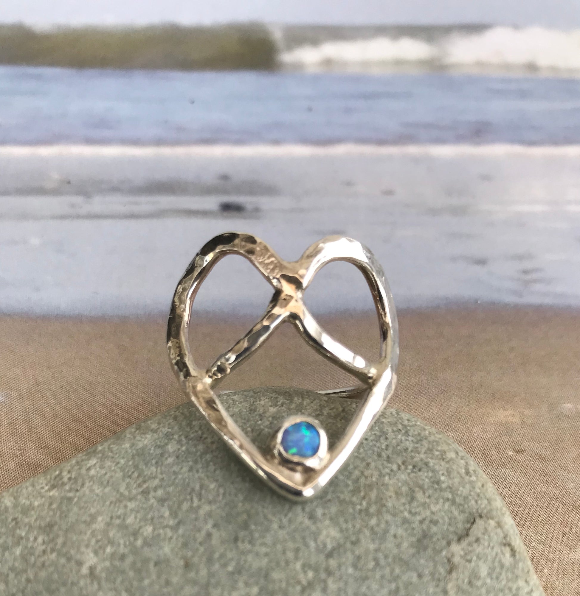 Heart crossover ring with opal