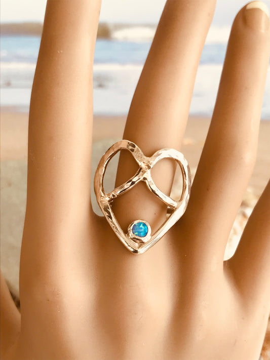Heart crossover ring with opal