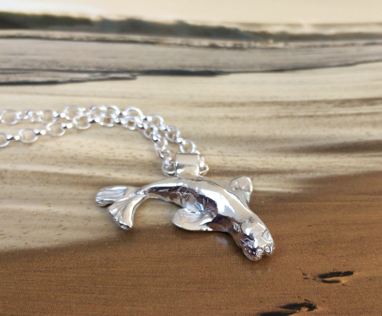 Grey mother seal necklace