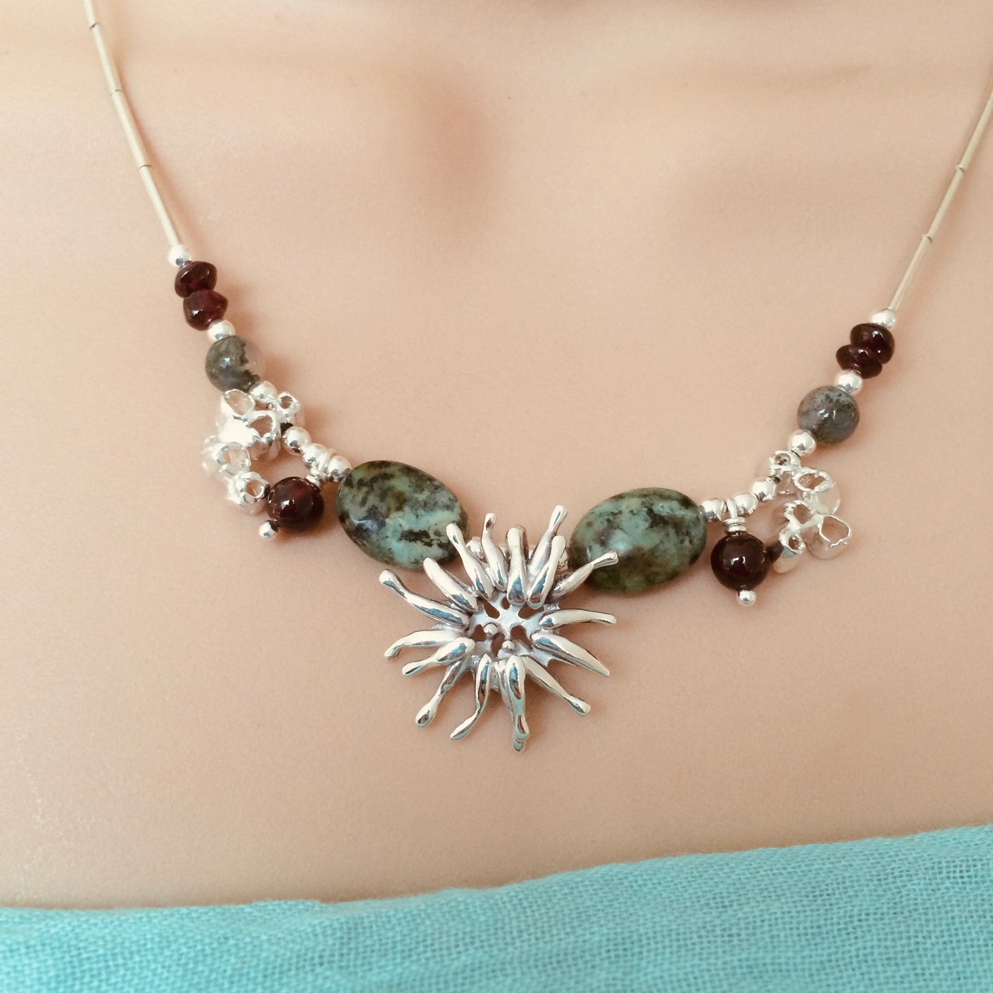 Sea anemone necklace with barnacles