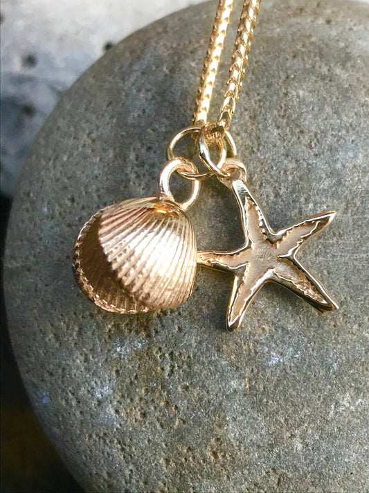 Gold cockle shell and starfish necklace