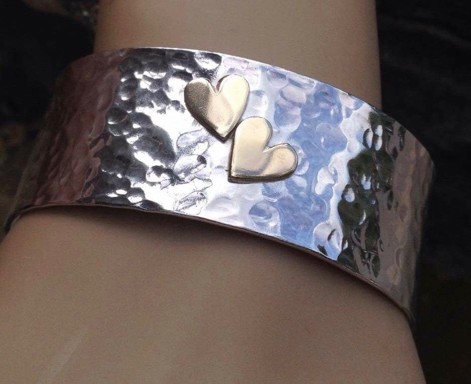 Silver cuff with hearts bracelet