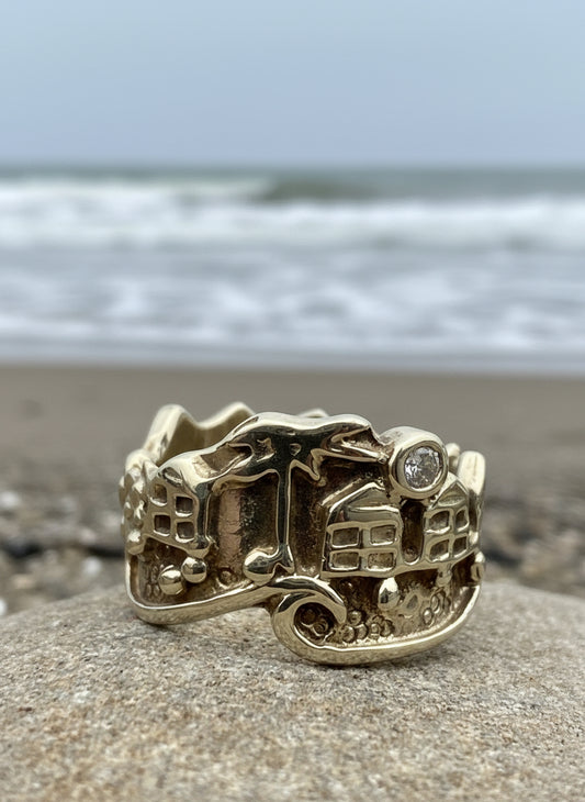Langland Bay ring in solid gold with beach huts palm trees and waves 